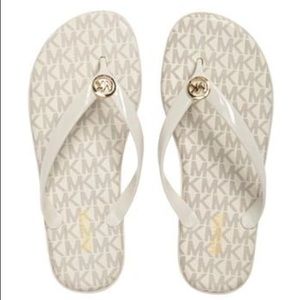 Michael Kors Flip Flops. Brand new in box. Size 8